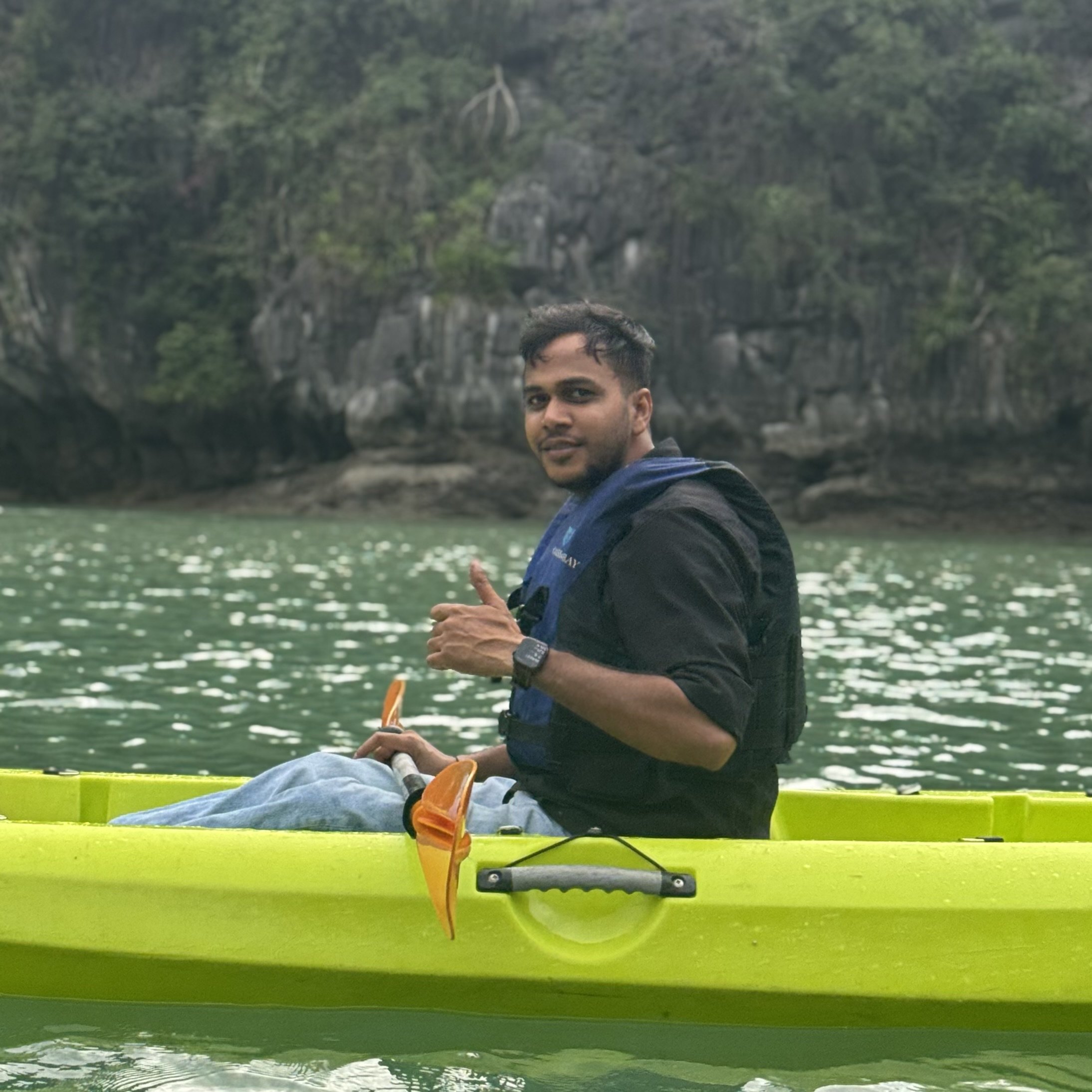 Suraj Raikwar kayaking while travelling
